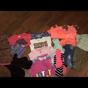 Lot of girls clothing, jeans, shirts, vests, etc